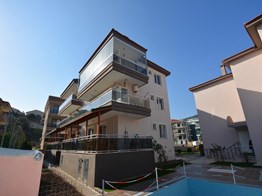 YENİFOÇA HAVUZLU SİTEDE ARA KAT 2+1DAİRE